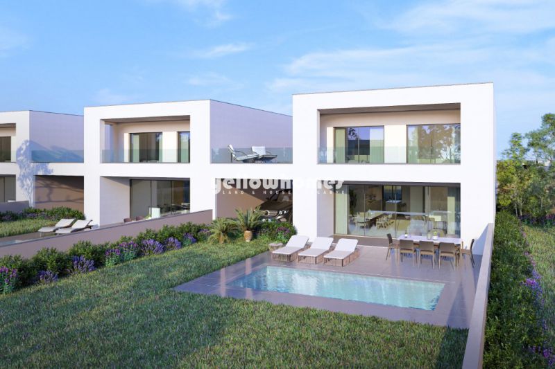 Moradias modernas V4 com jardim privado e piscina perto de Vilamoura/Vila Sol